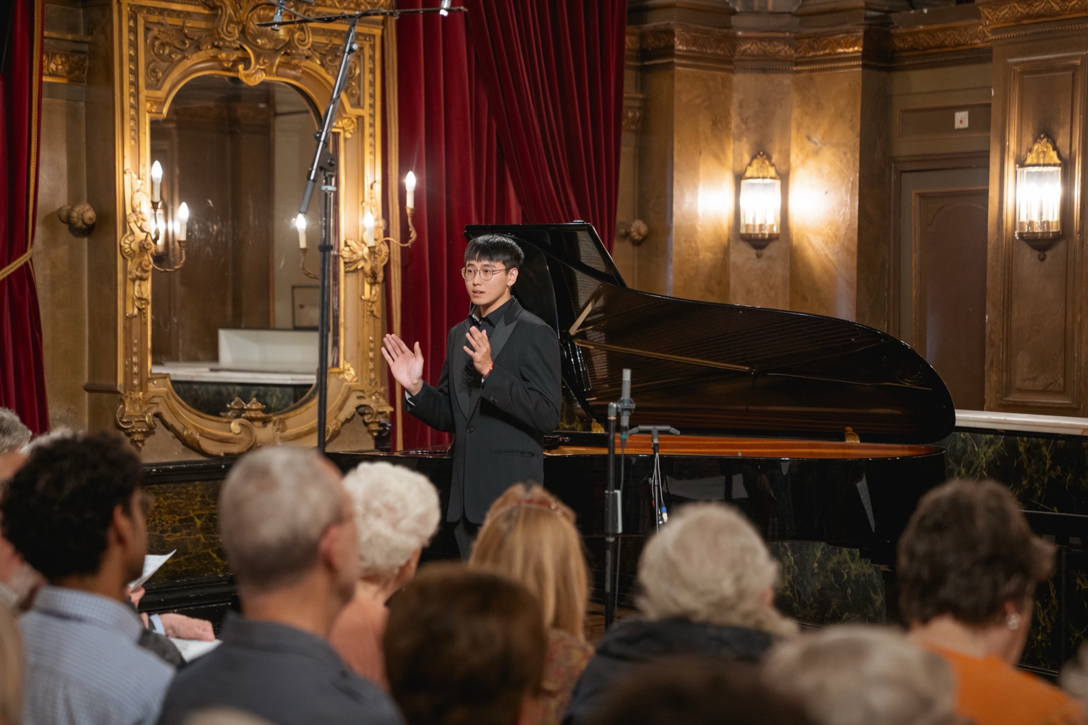 Junlian Bai performing in a concert hall